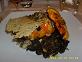 Risotto in a pumpkin - Risotto served in a little pumpkin on top of braised greens.