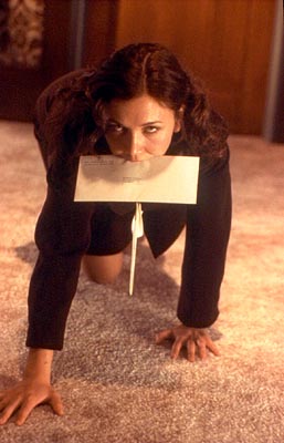 Maggie Gyllenhaal - from 'Secretary' - .JPG image of actress Maggie Gyllenhaal in a scene from the 2002 movie, 'Secretary'
