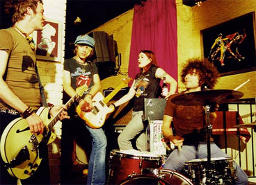 Dandy Warhols -  I like watching a video of this band... very arts :)