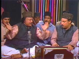 Ustad Nusrat Fateh Ali Khan - Ustad Nusrat Fateh Ali Khan, the legendry singer, with his brother and other companions at a performance.