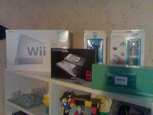 My nintendo box collection !!  - my collection: nintendo wii box, with wiiplay and nunchuk box, nintendo ds box, and nintendo gameboy micro box! :D i love nintendo :D