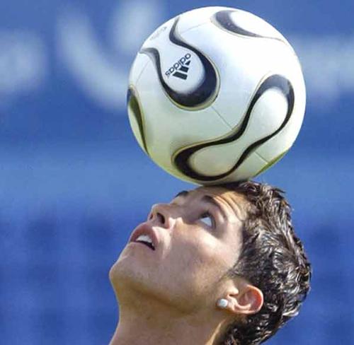 Ronaldo - Ronaldo Balncing th ball on his head.