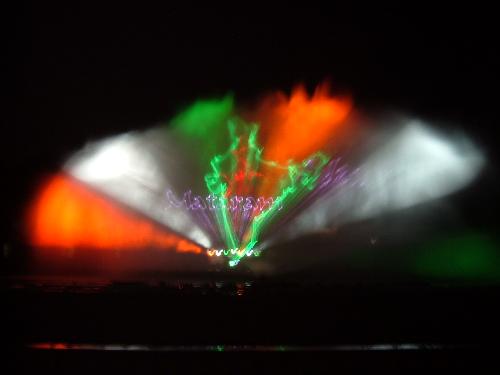 Tricolors of India - orange,white,green the tricolors of india being projected at Hyderabad's Laser Show. Also seen in this picture is the geographical shape of India.