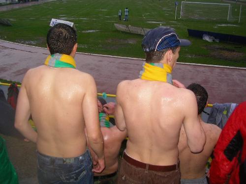 in the rain - Standing in the rain, on a fotball game.