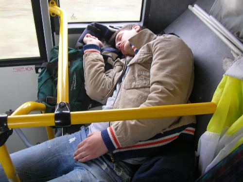 sleeping on a bus - Gabriel, my friend sleeping in a bus, he was very tired.