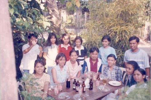 happy celebration - it's my birthday with my friends in our front yard having light drinks and eating session.