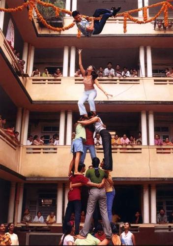 breaking of earthen pots - Breaking of earthen pots at an height of 40 to 60 feet is not a joke. By making a human pyramid, we make it in festvals.