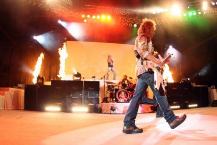Poison Greatest Piks - While the band was already quite popular by the end of 1987, 1988's Open Up Say...Ahhh! was their commercial breakthrough, due to the massive hits 'Fallen Angel,' 'Nothin' But a Good Time,' and 'Every Rose Has Its Thorn.' After a prosperous tour with David Lee Roth, the group returned to the studio to record Flesh and Blood in 1990. The album, which included the upbeat 'Unskinny Bop' and the sentimental 'Something to Believe In,' was another major success. The dynamic tour supporting the record brought on the release of Swallow This Live, a double-disc set which included live versions of their biggest hits, along with four new studio tracks. The band was secretly falling apart, as an infamous appearance on MTV showed Deville perform nearly half of 'Talk Dirty to Me' with his guitar unplugged. The band broke into a brawl backstage after the disastrous performance.