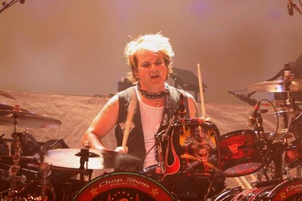 Poison Greatest Piks - While the band was already quite popular by the end of 1987, 1988's Open Up Say...Ahhh! was their commercial breakthrough, due to the massive hits 'Fallen Angel,' 'Nothin' But a Good Time,' and 'Every Rose Has Its Thorn.' After a prosperous tour with David Lee Roth, the group returned to the studio to record Flesh and Blood in 1990. The album, which included the upbeat 'Unskinny Bop' and the sentimental 'Something to Believe In,' was another major success. The dynamic tour supporting the record brought on the release of Swallow This Live, a double-disc set which included live versions of their biggest hits, along with four new studio tracks. The band was secretly falling apart, as an infamous appearance on MTV showed Deville perform nearly half of 'Talk Dirty to Me' with his guitar unplugged. The band broke into a brawl backstage after the disastrous performance.