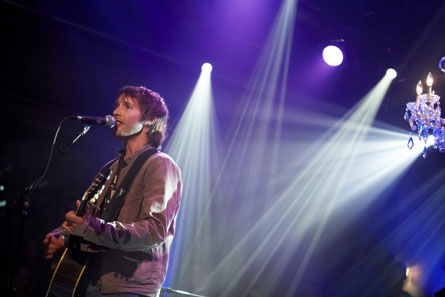 James Blunt picture gallery - Take 'No Bravery', the song that closes his debut album, 'Back to Bedlam', for instance: It was written in Kosovo in 1999, while James was a reconnaissance officer in the British army. On patrol around Pristina, he kept his guitar bolted to the outside of his tank. But in quieter moments, it came out, as he wrote about life as a 22-year-old peacekeeper in the aftermath of one of the decade's bloodiest civil wars. The rest of his unit ordered him to keep the noise down as he wrote and sang in the post-midnight stillness. He didn't keep the noise down. ''No Bravery' is the only complete song I wrote in Kosovo. I wrote it lying by my tank in my sleeping bag with my boots on. You had to sleep with your boots on. The song is pretty fatalistic. The rest of the album is fatalistic,' he says wryly.