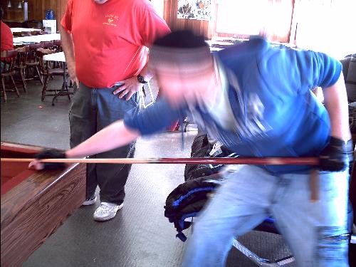 some kid playin pool  - this kid i was facin playing pool 
