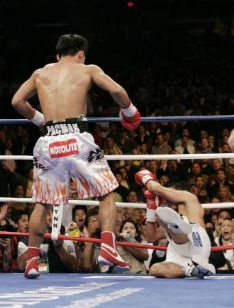 Pacman vs. El Terrible - Morales TKO'd!