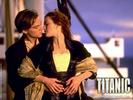 titanic - jack and rose on the deck of titanic start kissing each other