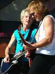 Reo Speedwagon - REO Speedwagon is an American rock band which grew in popularity in the Midwestern United States during the 1970s and peaked in the early 1980s. REO Speedwagon hits include 'Keep On Loving You' and 'Can't Fight This Feeling.' Both songs are power ballads, the former being prototypical of the genre and appearing on the group's most commercially successful album, Hi Infidelity, which also included the hit 'Take It On The Run,' a song that peaked at number five on the U.S. charts. Earlier REO songs 'Ridin' The Storm Out,' 'Golden Country,' 'Roll With The Changes,' and 'Time For Me To Fly' enjoy continuous rotation on classic rock radio stations.