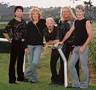 Reo Speedwagon - REO Speedwagon is an American rock band which grew in popularity in the Midwestern United States during the 1970s and peaked in the early 1980s. REO Speedwagon hits include 'Keep On Loving You' and 'Can't Fight This Feeling.' Both songs are power ballads, the former being prototypical of the genre and appearing on the group's most commercially successful album, Hi Infidelity, which also included the hit 'Take It On The Run,' a song that peaked at number five on the U.S. charts. Earlier REO songs 'Ridin' The Storm Out,' 'Golden Country,' 'Roll With The Changes,' and 'Time For Me To Fly' enjoy continuous rotation on classic rock radio stations.