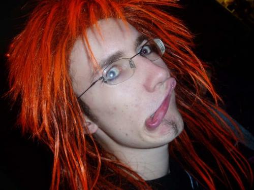 The rocker - The hair isn't real, 'tis but a wig. D'oh...  This is me at my parents' 25th wedding aniversary - sometime in 2005.  I was only 17 back then, oooh the pain of it all.
