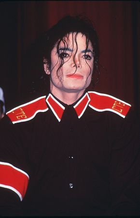 Michael Jackson - Michael Joseph Jackson (born August 29, 1958) is an American musician, entertainer and pop icon, whose successful music career and controversial personal life have been a part of pop culture for the last quarter-century.  Jackson began his musical career at the age of seven as the lead singer of The Jackson 5 and released his first solo recording, Got to Be There in 1971, while remaining a member of the group.[2] He began a full-fledged solo career in 1979 and formally parted with his siblings in 1984.[3] In his solo career, Jackson recorded and co-produced the best-selling album of all time, Thriller, which was named as the world's best-selling album at the 2006 World Music Awards. It has worldwide sales exceeding 104 million.[4] Michael Jackson has received thirteen Grammy awards[5] and charted thirteen number-one singles in the United States.  Throughout his four-decade career, Michael Jackson has been awarded numerous honors including the World Music Award's Best-Selling Pop Male Artist of the Millennium, American Music Award's Artist of the Century Award[6] and the Bambi Award's Pop Artist of the Millennium Award.[7] He is a double-inductee of the Rock and Roll Hall of Fame (once as a member of The Jackson 5 in 1997, and as a solo artist in 2001)[8] and an inductee of the Songwriters Hall of Fame.[9] Raymone Bain, Jackson's PR, claims that Jackson has sold over 750 million units worldwide.[10]  From 1988 to 2005, Jackson lived on his Neverland Ranch property, on which he built an amusement park and private zoo that was frequently attended by disadvantaged and terminally ill children. Rumours of sleepover parties received disparaging media coverage after it was revealed that children frequently slept in his bed or bedroom. These first came to light when he was accused of child sexual abuse in 1993. Michael Jackson's relationship with children was brought into the spotlight again in 2003 during the TV documentary Living with Michael Jackson. This resulted in Jackson being tried, and later acquitted, of more child molestation allegations and several other charges in 2005. Contents [hide] 1 Biography  1.1 1966–1980: Early life and career 1.2 1982–1986: The Thriller era 1.3 1987–1990: Bad and controversies 1.4 1991–1994: Dangerous and further career 1.5 1995–2000: HIStory and Blood on the Dance Floor 1.6 2001–2003: Invincible, Berlin and Martin Bashir 1.7 2003–2006: Trial, acquittal and the aftermath 1.8 2006–present: Visionary, Tokyo and the World Music Awards 2 Discography  2.1 Studio albums 2.2 Number-one singles  2.2.1 US number-one singles 2.2.2 UK number-one singles 3 Filmography  3.1 Notable music videos 3.2 Films 3.3 Videos/DVDs 3.4 Television 3.5 Video games 4 Music samples 5 Further reading 6 References 7 See also  7.1 Michael Jackson articles 7.2 Other related articles 8 External links  Biography  1966–1980: Early life and career Main articles: The Jackson 5 and Off the Wall   The cover to Michael Jackson's 1971's Got to Be There.  Michael Jackson was born in Gary, Indiana. He is the second-youngest brother of seven and the eighth of ten children of Joseph and Katherine Jackson. In 1966, after taking co-lead singing duties with brother Jermaine, the group's name changed from The Jackson Brothers to The Jackson 5. The group played at local clubs and bars, building up a following and eventually signing a contract with Motown Records in 1968.[11] The group hit stardom, with their first four singles which charted at number-one on the Billboard Hot 100. As a solo artist, Jackson released Got to Be There and Ben in 1972. These were released as part of the Jackson 5 franchise and produced successful singles such as 'Got to Be There', 'Ben', and a remake of Bobby Day's 'Rockin' Robin'.  The group's sales declined after 1973, and the group chafed under Motown's strict refusal to allow the Jacksons creative control or input. In 1976, the group signed a new contract with CBS Records (first joining the Philadelphia International division and then Epic Records).[12] When this became apparent to Motown Records, they sued the group for breach of contract.  As a result of the legal proceedings, which were complicated further by the fact that Jermaine Jackson was married to the daughter of Motown president (Berry Gordy), the Jacksons lost the rights to use the 'Jackson 5' name and logo and also Jermaine, who wanted to stay at Motown.[13] They changed their name to 'The Jacksons', featuring youngest brother Randy in Jermaine's place, and continued their successful career, touring internationally and releasing six more albums between 1976 and 1984, with Jermaine eventually re-joining in 1983, making them a sextet.  In 1978, Jackson starred as the scarecrow in The Wiz with former-label mate Diana Ross playing Dorothy.[14] The songs for the musical were arranged by Quincy Jones, who established a partnership with Jackson during the film's production and agreed to produce his first solo album in four years. Off the Wall, released in 1979, was a worldwide hit, and became the first album in history to spawn four top-ten hits, including 'Don't Stop 'Til You Get Enough' and 'Rock with You'.[2]  In January 1980, Jackson won his first awards for his solo efforts at the American Music Awards. He won 'Favorite Soul/R&B Album' (for Off the Wall), 'Favorite Male Soul/R&B Artist' and Favorite Soul/R&B Single (for 'Don't Stop 'Til You Get Enough').[2] Later that month, he also won two Billboard Awards (for 'Top Black Artist' and 'Top Black Album').[2]  On February 27, 1980, Jackson won a Grammy Award for 'Best R&B Vocal Performance, Male' (for 'Don't Stop 'Til You Get Enough').[2]  1982–1986: The Thriller era Main articles: Thriller (album), We Are the World, and Captain EO   The original album cover to 1982's Thriller.  In November 1982, the storybook for E.T.: The Extra-terrestrial was released. It included Jackson reading the story as well as one original song ('Someone in the Dark'). The album later won a Grammy for 'Best Album for Children'.  In December 1982, Jackson released his second Epic album, Thriller, which became the best-selling album in music history. The album spawned seven hit singles, including 'Billie Jean' (which was the first music video by a black artist to receive regular airplay on MTV), 'Beat It' and the album's title track which was accompanied by a revolutionary music video. The thirteen-minute Thriller was critically acclaimed, and massive airplay lead to it being packaged with the featurette Making Michael Jackson's Thriller on VHS, where it became the best-selling music home video ever.[15] Thriller spent 37 weeks at number-one and remained on the Billboard album chart for 122 weeks. It was eventually certified 27x Platinum in the United States.[16]   Jackson with the Reagans in 1984.  In 1983, whilst performing 'Billie Jean' at the Motown 25: Yesterday, Today, Forever concert Jackson debuted what can be regarded as his signature move: the moonwalk.[15] In 1983, he started a sponsorship deal with Pepsi-Cola, and, as part of the deal, he agreed to star in a commercial. While filming a Pepsi commercial with his brothers in 1984, before a live audience, his hair caught on fire when a pyrotechnic effect went wrong. Jackson suffered serious burns on his scalp, which required skin grafts.[17]  In February 1984, Jackson is nominated for twelve Grammy awards and wins eight,[15] breaking the record for the most Grammy Awards won in a single year.[18] Seven were for the critically acclaimed Thriller and the other for the E.T.: The Extra-terrestrial storybook. In 1984, he also won eight American Music Awards and the 'Special Award of Merit' and three MTV Video Music Awards.  After reuniting with his brothers, he then helped to write the Victory album. He then performed and starred in the successful Victory Tour which started on July 6, 1984 and lasted for five months.[15]  In 1985, Jackson was invited to the White House and was personally thanked by then-President Ronald Reagan at a White House ceremony for donating the song 'Beat It' for use in drunk driving prevention television and radio public service announcements.[19]   Jackson continued his charity work in 1985 by co-writing, with Lionel Richie, the hit single 'We Are the World'. The charity single helped to raise money and awareness for the famine in East Africa and was one of the first instances where Jackson was seen as a humanitarian. The song also won a Grammy Award for 'Song of the Year'.[15]   Jackson in the video for 'Beat It'.  Controversy began when Jackson purchased shares in the ATV Music Publishing (a company which owned the rights to most of the Beatles' songs), making himself the majority shareholder. This move angered close friend and songwriter Paul McCartney, who had also made a bid for the company. Ironically, it was McCartney who advised Jackson on the merits of song ownership.[20] Their creative co-writing ended after this event. Following this controversial business deal, tabloid stories of Jackson sleeping in a hyperbaric oxygen chamber to stall the aging-process, and an allegation claiming Jackson attempted to purchase the bones of the Elephant Man inspired the pejorative nickname 'Wacko Jacko'. The name 'Wacko Jacko' would come to be detested by Jackson.[21]  In 1986, Jackson starred in the George Lucas-produced, Francis Ford Coppola-directed 3-D film Captain EO. The film lasted 17 minutes but had costs estimated at $17 million.[22] At the time, it was the most expensive film ever produced on a per-minute basis. In the USA, the Disney theme parks hosted Captain EO. Disneyland featured the film in tomorrow-land from September 18, 1986 until April 7, 1997. It was also featured in Walt Disney World in Epcot from September 12, 1986 until July 6, 1994. Two new songs featured in the film. These were 'Another Part of Me', which later appeared on Bad, and 'We