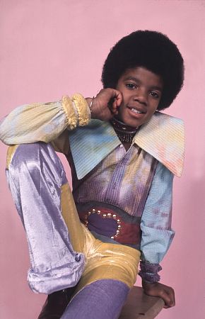 Michael Jackson - Michael Joseph Jackson (born August 29, 1958) is an American musician, entertainer and pop icon, whose successful music career and controversial personal life have been a part of pop culture for the last quarter-century.  Jackson began his musical career at the age of seven as the lead singer of The Jackson 5 and released his first solo recording, Got to Be There in 1971, while remaining a member of the group.[2] He began a full-fledged solo career in 1979 and formally parted with his siblings in 1984.[3] In his solo career, Jackson recorded and co-produced the best-selling album of all time, Thriller, which was named as the world's best-selling album at the 2006 World Music Awards. It has worldwide sales exceeding 104 million.[4] Michael Jackson has received thirteen Grammy awards[5] and charted thirteen number-one singles in the United States.  Throughout his four-decade career, Michael Jackson has been awarded numerous honors including the World Music Award's Best-Selling Pop Male Artist of the Millennium, American Music Award's Artist of the Century Award[6] and the Bambi Award's Pop Artist of the Millennium Award.[7] He is a double-inductee of the Rock and Roll Hall of Fame (once as a member of The Jackson 5 in 1997, and as a solo artist in 2001)[8] and an inductee of the Songwriters Hall of Fame.[9] Raymone Bain, Jackson's PR, claims that Jackson has sold over 750 million units worldwide.[10]  From 1988 to 2005, Jackson lived on his Neverland Ranch property, on which he built an amusement park and private zoo that was frequently attended by disadvantaged and terminally ill children. Rumours of sleepover parties received disparaging media coverage after it was revealed that children frequently slept in his bed or bedroom. These first came to light when he was accused of child sexual abuse in 1993. Michael Jackson's relationship with children was brought into the spotlight again in 2003 during the TV documentary Living with Michael Jackson. This resulted in Jackson being tried, and later acquitted, of more child molestation allegations and several other charges in 2005. Contents [hide] 1 Biography  1.1 1966–1980: Early life and career 1.2 1982–1986: The Thriller era 1.3 1987–1990: Bad and controversies 1.4 1991–1994: Dangerous and further career 1.5 1995–2000: HIStory and Blood on the Dance Floor 1.6 2001–2003: Invincible, Berlin and Martin Bashir 1.7 2003–2006: Trial, acquittal and the aftermath 1.8 2006–present: Visionary, Tokyo and the World Music Awards 2 Discography  2.1 Studio albums 2.2 Number-one singles  2.2.1 US number-one singles 2.2.2 UK number-one singles 3 Filmography  3.1 Notable music videos 3.2 Films 3.3 Videos/DVDs 3.4 Television 3.5 Video games 4 Music samples 5 Further reading 6 References 7 See also  7.1 Michael Jackson articles 7.2 Other related articles 8 External links  Biography  1966–1980: Early life and career Main articles: The Jackson 5 and Off the Wall   The cover to Michael Jackson's 1971's Got to Be There.  Michael Jackson was born in Gary, Indiana. He is the second-youngest brother of seven and the eighth of ten children of Joseph and Katherine Jackson. In 1966, after taking co-lead singing duties with brother Jermaine, the group's name changed from The Jackson Brothers to The Jackson 5. The group played at local clubs and bars, building up a following and eventually signing a contract with Motown Records in 1968.[11] The group hit stardom, with their first four singles which charted at number-one on the Billboard Hot 100. As a solo artist, Jackson released Got to Be There and Ben in 1972. These were released as part of the Jackson 5 franchise and produced successful singles such as 'Got to Be There', 'Ben', and a remake of Bobby Day's 'Rockin' Robin'.  The group's sales declined after 1973, and the group chafed under Motown's strict refusal to allow the Jacksons creative control or input. In 1976, the group signed a new contract with CBS Records (first joining the Philadelphia International division and then Epic Records).[12] When this became apparent to Motown Records, they sued the group for breach of contract.  As a result of the legal proceedings, which were complicated further by the fact that Jermaine Jackson was married to the daughter of Motown president (Berry Gordy), the Jacksons lost the rights to use the 'Jackson 5' name and logo and also Jermaine, who wanted to stay at Motown.[13] They changed their name to 'The Jacksons', featuring youngest brother Randy in Jermaine's place, and continued their successful career, touring internationally and releasing six more albums between 1976 and 1984, with Jermaine eventually re-joining in 1983, making them a sextet.  In 1978, Jackson starred as the scarecrow in The Wiz with former-label mate Diana Ross playing Dorothy.[14] The songs for the musical were arranged by Quincy Jones, who established a partnership with Jackson during the film's production and agreed to produce his first solo album in four years. Off the Wall, released in 1979, was a worldwide hit, and became the first album in history to spawn four top-ten hits, including 'Don't Stop 'Til You Get Enough' and 'Rock with You'.[2]  In January 1980, Jackson won his first awards for his solo efforts at the American Music Awards. He won 'Favorite Soul/R&B Album' (for Off the Wall), 'Favorite Male Soul/R&B Artist' and Favorite Soul/R&B Single (for 'Don't Stop 'Til You Get Enough').[2] Later that month, he also won two Billboard Awards (for 'Top Black Artist' and 'Top Black Album').[2]  On February 27, 1980, Jackson won a Grammy Award for 'Best R&B Vocal Performance, Male' (for 'Don't Stop 'Til You Get Enough').[2]  1982–1986: The Thriller era Main articles: Thriller (album), We Are the World, and Captain EO   The original album cover to 1982's Thriller.  In November 1982, the storybook for E.T.: The Extra-terrestrial was released. It included Jackson reading the story as well as one original song ('Someone in the Dark'). The album later won a Grammy for 'Best Album for Children'.  In December 1982, Jackson released his second Epic album, Thriller, which became the best-selling album in music history. The album spawned seven hit singles, including 'Billie Jean' (which was the first music video by a black artist to receive regular airplay on MTV), 'Beat It' and the album's title track which was accompanied by a revolutionary music video. The thirteen-minute Thriller was critically acclaimed, and massive airplay lead to it being packaged with the featurette Making Michael Jackson's Thriller on VHS, where it became the best-selling music home video ever.[15] Thriller spent 37 weeks at number-one and remained on the Billboard album chart for 122 weeks. It was eventually certified 27x Platinum in the United States.[16]   Jackson with the Reagans in 1984.  In 1983, whilst performing 'Billie Jean' at the Motown 25: Yesterday, Today, Forever concert Jackson debuted what can be regarded as his signature move: the moonwalk.[15] In 1983, he started a sponsorship deal with Pepsi-Cola, and, as part of the deal, he agreed to star in a commercial. While filming a Pepsi commercial with his brothers in 1984, before a live audience, his hair caught on fire when a pyrotechnic effect went wrong. Jackson suffered serious burns on his scalp, which required skin grafts.[17]  In February 1984, Jackson is nominated for twelve Grammy awards and wins eight,[15] breaking the record for the most Grammy Awards won in a single year.[18] Seven were for the critically acclaimed Thriller and the other for the E.T.: The Extra-terrestrial storybook. In 1984, he also won eight American Music Awards and the 'Special Award of Merit' and three MTV Video Music Awards.  After reuniting with his brothers, he then helped to write the Victory album. He then performed and starred in the successful Victory Tour which started on July 6, 1984 and lasted for five months.[15]  In 1985, Jackson was invited to the White House and was personally thanked by then-President Ronald Reagan at a White House ceremony for donating the song 'Beat It' for use in drunk driving prevention television and radio public service announcements.[19]   Jackson continued his charity work in 1985 by co-writing, with Lionel Richie, the hit single 'We Are the World'. The charity single helped to raise money and awareness for the famine in East Africa and was one of the first instances where Jackson was seen as a humanitarian. The song also won a Grammy Award for 'Song of the Year'.[15]   Jackson in the video for 'Beat It'.  Controversy began when Jackson purchased shares in the ATV Music Publishing (a company which owned the rights to most of the Beatles' songs), making himself the majority shareholder. This move angered close friend and songwriter Paul McCartney, who had also made a bid for the company. Ironically, it was McCartney who advised Jackson on the merits of song ownership.[20] Their creative co-writing ended after this event. Following this controversial business deal, tabloid stories of Jackson sleeping in a hyperbaric oxygen chamber to stall the aging-process, and an allegation claiming Jackson attempted to purchase the bones of the Elephant Man inspired the pejorative nickname 'Wacko Jacko'. The name 'Wacko Jacko' would come to be detested by Jackson.[21]  In 1986, Jackson starred in the George Lucas-produced, Francis Ford Coppola-directed 3-D film Captain EO. The film lasted 17 minutes but had costs estimated at $17 million.[22] At the time, it was the most expensive film ever produced on a per-minute basis. In the USA, the Disney theme parks hosted Captain EO. Disneyland featured the film in tomorrow-land from September 18, 1986 until April 7, 1997. It was also featured in Walt Disney World in Epcot from September 12, 1986 until July 6, 1994. Two new songs featured in the film. These were 'Another Part of Me', which later appeared on Bad, and 'We