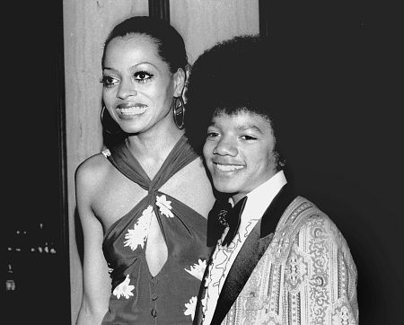 Michael Jackson - Michael Joseph Jackson (born August 29, 1958) is an American musician, entertainer and pop icon, whose successful music career and controversial personal life have been a part of pop culture for the last quarter-century.  Jackson began his musical career at the age of seven as the lead singer of The Jackson 5 and released his first solo recording, Got to Be There in 1971, while remaining a member of the group.[2] He began a full-fledged solo career in 1979 and formally parted with his siblings in 1984.[3] In his solo career, Jackson recorded and co-produced the best-selling album of all time, Thriller, which was named as the world's best-selling album at the 2006 World Music Awards. It has worldwide sales exceeding 104 million.[4] Michael Jackson has received thirteen Grammy awards[5] and charted thirteen number-one singles in the United States.  Throughout his four-decade career, Michael Jackson has been awarded numerous honors including the World Music Award's Best-Selling Pop Male Artist of the Millennium, American Music Award's Artist of the Century Award[6] and the Bambi Award's Pop Artist of the Millennium Award.[7] He is a double-inductee of the Rock and Roll Hall of Fame (once as a member of The Jackson 5 in 1997, and as a solo artist in 2001)[8] and an inductee of the Songwriters Hall of Fame.[9] Raymone Bain, Jackson's PR, claims that Jackson has sold over 750 million units worldwide.[10]  From 1988 to 2005, Jackson lived on his Neverland Ranch property, on which he built an amusement park and private zoo that was frequently attended by disadvantaged and terminally ill children. Rumours of sleepover parties received disparaging media coverage after it was revealed that children frequently slept in his bed or bedroom. These first came to light when he was accused of child sexual abuse in 1993. Michael Jackson's relationship with children was brought into the spotlight again in 2003 during the TV documentary Living with Michael Jackson. This resulted in Jackson being tried, and later acquitted, of more child molestation allegations and several other charges in 2005. Contents [hide] 1 Biography  1.1 1966–1980: Early life and career 1.2 1982–1986: The Thriller era 1.3 1987–1990: Bad and controversies 1.4 1991–1994: Dangerous and further career 1.5 1995–2000: HIStory and Blood on the Dance Floor 1.6 2001–2003: Invincible, Berlin and Martin Bashir 1.7 2003–2006: Trial, acquittal and the aftermath 1.8 2006–present: Visionary, Tokyo and the World Music Awards 2 Discography  2.1 Studio albums 2.2 Number-one singles  2.2.1 US number-one singles 2.2.2 UK number-one singles 3 Filmography  3.1 Notable music videos 3.2 Films 3.3 Videos/DVDs 3.4 Television 3.5 Video games 4 Music samples 5 Further reading 6 References 7 See also  7.1 Michael Jackson articles 7.2 Other related articles 8 External links  Biography  1966–1980: Early life and career Main articles: The Jackson 5 and Off the Wall   The cover to Michael Jackson's 1971's Got to Be There.  Michael Jackson was born in Gary, Indiana. He is the second-youngest brother of seven and the eighth of ten children of Joseph and Katherine Jackson. In 1966, after taking co-lead singing duties with brother Jermaine, the group's name changed from The Jackson Brothers to The Jackson 5. The group played at local clubs and bars, building up a following and eventually signing a contract with Motown Records in 1968.[11] The group hit stardom, with their first four singles which charted at number-one on the Billboard Hot 100. As a solo artist, Jackson released Got to Be There and Ben in 1972. These were released as part of the Jackson 5 franchise and produced successful singles such as 'Got to Be There', 'Ben', and a remake of Bobby Day's 'Rockin' Robin'.  The group's sales declined after 1973, and the group chafed under Motown's strict refusal to allow the Jacksons creative control or input. In 1976, the group signed a new contract with CBS Records (first joining the Philadelphia International division and then Epic Records).[12] When this became apparent to Motown Records, they sued the group for breach of contract.  As a result of the legal proceedings, which were complicated further by the fact that Jermaine Jackson was married to the daughter of Motown president (Berry Gordy), the Jacksons lost the rights to use the 'Jackson 5' name and logo and also Jermaine, who wanted to stay at Motown.[13] They changed their name to 'The Jacksons', featuring youngest brother Randy in Jermaine's place, and continued their successful career, touring internationally and releasing six more albums between 1976 and 1984, with Jermaine eventually re-joining in 1983, making them a sextet.  In 1978, Jackson starred as the scarecrow in The Wiz with former-label mate Diana Ross playing Dorothy.[14] The songs for the musical were arranged by Quincy Jones, who established a partnership with Jackson during the film's production and agreed to produce his first solo album in four years. Off the Wall, released in 1979, was a worldwide hit, and became the first album in history to spawn four top-ten hits, including 'Don't Stop 'Til You Get Enough' and 'Rock with You'.[2]  In January 1980, Jackson won his first awards for his solo efforts at the American Music Awards. He won 'Favorite Soul/R&B Album' (for Off the Wall), 'Favorite Male Soul/R&B Artist' and Favorite Soul/R&B Single (for 'Don't Stop 'Til You Get Enough').[2] Later that month, he also won two Billboard Awards (for 'Top Black Artist' and 'Top Black Album').[2]  On February 27, 1980, Jackson won a Grammy Award for 'Best R&B Vocal Performance, Male' (for 'Don't Stop 'Til You Get Enough').[2]  1982–1986: The Thriller era Main articles: Thriller (album), We Are the World, and Captain EO   The original album cover to 1982's Thriller.  In November 1982, the storybook for E.T.: The Extra-terrestrial was released. It included Jackson reading the story as well as one original song ('Someone in the Dark'). The album later won a Grammy for 'Best Album for Children'.  In December 1982, Jackson released his second Epic album, Thriller, which became the best-selling album in music history. The album spawned seven hit singles, including 'Billie Jean' (which was the first music video by a black artist to receive regular airplay on MTV), 'Beat It' and the album's title track which was accompanied by a revolutionary music video. The thirteen-minute Thriller was critically acclaimed, and massive airplay lead to it being packaged with the featurette Making Michael Jackson's Thriller on VHS, where it became the best-selling music home video ever.[15] Thriller spent 37 weeks at number-one and remained on the Billboard album chart for 122 weeks. It was eventually certified 27x Platinum in the United States.[16]   Jackson with the Reagans in 1984.  In 1983, whilst performing 'Billie Jean' at the Motown 25: Yesterday, Today, Forever concert Jackson debuted what can be regarded as his signature move: the moonwalk.[15] In 1983, he started a sponsorship deal with Pepsi-Cola, and, as part of the deal, he agreed to star in a commercial. While filming a Pepsi commercial with his brothers in 1984, before a live audience, his hair caught on fire when a pyrotechnic effect went wrong. Jackson suffered serious burns on his scalp, which required skin grafts.[17]  In February 1984, Jackson is nominated for twelve Grammy awards and wins eight,[15] breaking the record for the most Grammy Awards won in a single year.[18] Seven were for the critically acclaimed Thriller and the other for the E.T.: The Extra-terrestrial storybook. In 1984, he also won eight American Music Awards and the 'Special Award of Merit' and three MTV Video Music Awards.  After reuniting with his brothers, he then helped to write the Victory album. He then performed and starred in the successful Victory Tour which started on July 6, 1984 and lasted for five months.[15]  In 1985, Jackson was invited to the White House and was personally thanked by then-President Ronald Reagan at a White House ceremony for donating the song 'Beat It' for use in drunk driving prevention television and radio public service announcements.[19]   Jackson continued his charity work in 1985 by co-writing, with Lionel Richie, the hit single 'We Are the World'. The charity single helped to raise money and awareness for the famine in East Africa and was one of the first instances where Jackson was seen as a humanitarian. The song also won a Grammy Award for 'Song of the Year'.[15]   Jackson in the video for 'Beat It'.  Controversy began when Jackson purchased shares in the ATV Music Publishing (a company which owned the rights to most of the Beatles' songs), making himself the majority shareholder. This move angered close friend and songwriter Paul McCartney, who had also made a bid for the company. Ironically, it was McCartney who advised Jackson on the merits of song ownership.[20] Their creative co-writing ended after this event. Following this controversial business deal, tabloid stories of Jackson sleeping in a hyperbaric oxygen chamber to stall the aging-process, and an allegation claiming Jackson attempted to purchase the bones of the Elephant Man inspired the pejorative nickname 'Wacko Jacko'. The name 'Wacko Jacko' would come to be detested by Jackson.[21]  In 1986, Jackson starred in the George Lucas-produced, Francis Ford Coppola-directed 3-D film Captain EO. The film lasted 17 minutes but had costs estimated at $17 million.[22] At the time, it was the most expensive film ever produced on a per-minute basis. In the USA, the Disney theme parks hosted Captain EO. Disneyland featured the film in tomorrow-land from September 18, 1986 until April 7, 1997. It was also featured in Walt Disney World in Epcot from September 12, 1986 until July 6, 1994. Two new songs featured in the film. These were 'Another Part of Me', which later appeared on Bad, and 'We