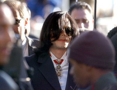 Michael Jackson - Michael Joseph Jackson (born August 29, 1958) is an American musician, entertainer and pop icon, whose successful music career and controversial personal life have been a part of pop culture for the last quarter-century.  Jackson began his musical career at the age of seven as the lead singer of The Jackson 5 and released his first solo recording, Got to Be There in 1971, while remaining a member of the group.[2] He began a full-fledged solo career in 1979 and formally parted with his siblings in 1984.[3] In his solo career, Jackson recorded and co-produced the best-selling album of all time, Thriller, which was named as the world's best-selling album at the 2006 World Music Awards. It has worldwide sales exceeding 104 million.[4] Michael Jackson has received thirteen Grammy awards[5] and charted thirteen number-one singles in the United States.  Throughout his four-decade career, Michael Jackson has been awarded numerous honors including the World Music Award's Best-Selling Pop Male Artist of the Millennium, American Music Award's Artist of the Century Award[6] and the Bambi Award's Pop Artist of the Millennium Award.[7] He is a double-inductee of the Rock and Roll Hall of Fame (once as a member of The Jackson 5 in 1997, and as a solo artist in 2001)[8] and an inductee of the Songwriters Hall of Fame.[9] Raymone Bain, Jackson's PR, claims that Jackson has sold over 750 million units worldwide.[10]  From 1988 to 2005, Jackson lived on his Neverland Ranch property, on which he built an amusement park and private zoo that was frequently attended by disadvantaged and terminally ill children. Rumours of sleepover parties received disparaging media coverage after it was revealed that children frequently slept in his bed or bedroom. These first came to light when he was accused of child sexual abuse in 1993. Michael Jackson's relationship with children was brought into the spotlight again in 2003 during the TV documentary Living with Michael Jackson. This resulted in Jackson being tried, and later acquitted, of more child molestation allegations and several other charges in 2005. Contents [hide] 1 Biography  1.1 1966–1980: Early life and career 1.2 1982–1986: The Thriller era 1.3 1987–1990: Bad and controversies 1.4 1991–1994: Dangerous and further career 1.5 1995–2000: HIStory and Blood on the Dance Floor 1.6 2001–2003: Invincible, Berlin and Martin Bashir 1.7 2003–2006: Trial, acquittal and the aftermath 1.8 2006–present: Visionary, Tokyo and the World Music Awards 2 Discography  2.1 Studio albums 2.2 Number-one singles  2.2.1 US number-one singles 2.2.2 UK number-one singles 3 Filmography  3.1 Notable music videos 3.2 Films 3.3 Videos/DVDs 3.4 Television 3.5 Video games 4 Music samples 5 Further reading 6 References 7 See also  7.1 Michael Jackson articles 7.2 Other related articles 8 External links  Biography  1966–1980: Early life and career Main articles: The Jackson 5 and Off the Wall   The cover to Michael Jackson's 1971's Got to Be There.  Michael Jackson was born in Gary, Indiana. He is the second-youngest brother of seven and the eighth of ten children of Joseph and Katherine Jackson. In 1966, after taking co-lead singing duties with brother Jermaine, the group's name changed from The Jackson Brothers to The Jackson 5. The group played at local clubs and bars, building up a following and eventually signing a contract with Motown Records in 1968.[11] The group hit stardom, with their first four singles which charted at number-one on the Billboard Hot 100. As a solo artist, Jackson released Got to Be There and Ben in 1972. These were released as part of the Jackson 5 franchise and produced successful singles such as 'Got to Be There', 'Ben', and a remake of Bobby Day's 'Rockin' Robin'.  The group's sales declined after 1973, and the group chafed under Motown's strict refusal to allow the Jacksons creative control or input. In 1976, the group signed a new contract with CBS Records (first joining the Philadelphia International division and then Epic Records).[12] When this became apparent to Motown Records, they sued the group for breach of contract.  As a result of the legal proceedings, which were complicated further by the fact that Jermaine Jackson was married to the daughter of Motown president (Berry Gordy), the Jacksons lost the rights to use the 'Jackson 5' name and logo and also Jermaine, who wanted to stay at Motown.[13] They changed their name to 'The Jacksons', featuring youngest brother Randy in Jermaine's place, and continued their successful career, touring internationally and releasing six more albums between 1976 and 1984, with Jermaine eventually re-joining in 1983, making them a sextet.  In 1978, Jackson starred as the scarecrow in The Wiz with former-label mate Diana Ross playing Dorothy.[14] The songs for the musical were arranged by Quincy Jones, who established a partnership with Jackson during the film's production and agreed to produce his first solo album in four years. Off the Wall, released in 1979, was a worldwide hit, and became the first album in history to spawn four top-ten hits, including 'Don't Stop 'Til You Get Enough' and 'Rock with You'.[2]  In January 1980, Jackson won his first awards for his solo efforts at the American Music Awards. He won 'Favorite Soul/R&B Album' (for Off the Wall), 'Favorite Male Soul/R&B Artist' and Favorite Soul/R&B Single (for 'Don't Stop 'Til You Get Enough').[2] Later that month, he also won two Billboard Awards (for 'Top Black Artist' and 'Top Black Album').[2]  On February 27, 1980, Jackson won a Grammy Award for 'Best R&B Vocal Performance, Male' (for 'Don't Stop 'Til You Get Enough').[2]  1982–1986: The Thriller era Main articles: Thriller (album), We Are the World, and Captain EO   The original album cover to 1982's Thriller.  In November 1982, the storybook for E.T.: The Extra-terrestrial was released. It included Jackson reading the story as well as one original song ('Someone in the Dark'). The album later won a Grammy for 'Best Album for Children'.  In December 1982, Jackson released his second Epic album, Thriller, which became the best-selling album in music history. The album spawned seven hit singles, including 'Billie Jean' (which was the first music video by a black artist to receive regular airplay on MTV), 'Beat It' and the album's title track which was accompanied by a revolutionary music video. The thirteen-minute Thriller was critically acclaimed, and massive airplay lead to it being packaged with the featurette Making Michael Jackson's Thriller on VHS, where it became the best-selling music home video ever.[15] Thriller spent 37 weeks at number-one and remained on the Billboard album chart for 122 weeks. It was eventually certified 27x Platinum in the United States.[16]   Jackson with the Reagans in 1984.  In 1983, whilst performing 'Billie Jean' at the Motown 25: Yesterday, Today, Forever concert Jackson debuted what can be regarded as his signature move: the moonwalk.[15] In 1983, he started a sponsorship deal with Pepsi-Cola, and, as part of the deal, he agreed to star in a commercial. While filming a Pepsi commercial with his brothers in 1984, before a live audience, his hair caught on fire when a pyrotechnic effect went wrong. Jackson suffered serious burns on his scalp, which required skin grafts.[17]  In February 1984, Jackson is nominated for twelve Grammy awards and wins eight,[15] breaking the record for the most Grammy Awards won in a single year.[18] Seven were for the critically acclaimed Thriller and the other for the E.T.: The Extra-terrestrial storybook. In 1984, he also won eight American Music Awards and the 'Special Award of Merit' and three MTV Video Music Awards.  After reuniting with his brothers, he then helped to write the Victory album. He then performed and starred in the successful Victory Tour which started on July 6, 1984 and lasted for five months.[15]  In 1985, Jackson was invited to the White House and was personally thanked by then-President Ronald Reagan at a White House ceremony for donating the song 'Beat It' for use in drunk driving prevention television and radio public service announcements.[19]   Jackson continued his charity work in 1985 by co-writing, with Lionel Richie, the hit single 'We Are the World'. The charity single helped to raise money and awareness for the famine in East Africa and was one of the first instances where Jackson was seen as a humanitarian. The song also won a Grammy Award for 'Song of the Year'.[15]   Jackson in the video for 'Beat It'.  Controversy began when Jackson purchased shares in the ATV Music Publishing (a company which owned the rights to most of the Beatles' songs), making himself the majority shareholder. This move angered close friend and songwriter Paul McCartney, who had also made a bid for the company. Ironically, it was McCartney who advised Jackson on the merits of song ownership.[20] Their creative co-writing ended after this event. Following this controversial business deal, tabloid stories of Jackson sleeping in a hyperbaric oxygen chamber to stall the aging-process, and an allegation claiming Jackson attempted to purchase the bones of the Elephant Man inspired the pejorative nickname 'Wacko Jacko'. The name 'Wacko Jacko' would come to be detested by Jackson.[21]  In 1986, Jackson starred in the George Lucas-produced, Francis Ford Coppola-directed 3-D film Captain EO. The film lasted 17 minutes but had costs estimated at $17 million.[22] At the time, it was the most expensive film ever produced on a per-minute basis. In the USA, the Disney theme parks hosted Captain EO. Disneyland featured the film in tomorrow-land from September 18, 1986 until April 7, 1997. It was also featured in Walt Disney World in Epcot from September 12, 1986 until July 6, 1994. Two new songs featured in the film. These were 'Another Part of Me', which later appeared on Bad, and 'We