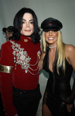 Michael Jackson - Michael Joseph Jackson (born August 29, 1958) is an American musician, entertainer and pop icon, whose successful music career and controversial personal life have been a part of pop culture for the last quarter-century.  Jackson began his musical career at the age of seven as the lead singer of The Jackson 5 and released his first solo recording, Got to Be There in 1971, while remaining a member of the group.[2] He began a full-fledged solo career in 1979 and formally parted with his siblings in 1984.[3] In his solo career, Jackson recorded and co-produced the best-selling album of all time, Thriller, which was named as the world's best-selling album at the 2006 World Music Awards. It has worldwide sales exceeding 104 million.[4] Michael Jackson has received thirteen Grammy awards[5] and charted thirteen number-one singles in the United States.  Throughout his four-decade career, Michael Jackson has been awarded numerous honors including the World Music Award's Best-Selling Pop Male Artist of the Millennium, American Music Award's Artist of the Century Award[6] and the Bambi Award's Pop Artist of the Millennium Award.[7] He is a double-inductee of the Rock and Roll Hall of Fame (once as a member of The Jackson 5 in 1997, and as a solo artist in 2001)[8] and an inductee of the Songwriters Hall of Fame.[9] Raymone Bain, Jackson's PR, claims that Jackson has sold over 750 million units worldwide.[10]  From 1988 to 2005, Jackson lived on his Neverland Ranch property, on which he built an amusement park and private zoo that was frequently attended by disadvantaged and terminally ill children. Rumours of sleepover parties received disparaging media coverage after it was revealed that children frequently slept in his bed or bedroom. These first came to light when he was accused of child sexual abuse in 1993. Michael Jackson's relationship with children was brought into the spotlight again in 2003 during the TV documentary Living with Michael Jackson. This resulted in Jackson being tried, and later acquitted, of more child molestation allegations and several other charges in 2005. Contents [hide] 1 Biography  1.1 1966–1980: Early life and career 1.2 1982–1986: The Thriller era 1.3 1987–1990: Bad and controversies 1.4 1991–1994: Dangerous and further career 1.5 1995–2000: HIStory and Blood on the Dance Floor 1.6 2001–2003: Invincible, Berlin and Martin Bashir 1.7 2003–2006: Trial, acquittal and the aftermath 1.8 2006–present: Visionary, Tokyo and the World Music Awards 2 Discography  2.1 Studio albums 2.2 Number-one singles  2.2.1 US number-one singles 2.2.2 UK number-one singles 3 Filmography  3.1 Notable music videos 3.2 Films 3.3 Videos/DVDs 3.4 Television 3.5 Video games 4 Music samples 5 Further reading 6 References 7 See also  7.1 Michael Jackson articles 7.2 Other related articles 8 External links  Biography  1966–1980: Early life and career Main articles: The Jackson 5 and Off the Wall   The cover to Michael Jackson's 1971's Got to Be There.  Michael Jackson was born in Gary, Indiana. He is the second-youngest brother of seven and the eighth of ten children of Joseph and Katherine Jackson. In 1966, after taking co-lead singing duties with brother Jermaine, the group's name changed from The Jackson Brothers to The Jackson 5. The group played at local clubs and bars, building up a following and eventually signing a contract with Motown Records in 1968.[11] The group hit stardom, with their first four singles which charted at number-one on the Billboard Hot 100. As a solo artist, Jackson released Got to Be There and Ben in 1972. These were released as part of the Jackson 5 franchise and produced successful singles such as 'Got to Be There', 'Ben', and a remake of Bobby Day's 'Rockin' Robin'.  The group's sales declined after 1973, and the group chafed under Motown's strict refusal to allow the Jacksons creative control or input. In 1976, the group signed a new contract with CBS Records (first joining the Philadelphia International division and then Epic Records).[12] When this became apparent to Motown Records, they sued the group for breach of contract.  As a result of the legal proceedings, which were complicated further by the fact that Jermaine Jackson was married to the daughter of Motown president (Berry Gordy), the Jacksons lost the rights to use the 'Jackson 5' name and logo and also Jermaine, who wanted to stay at Motown.[13] They changed their name to 'The Jacksons', featuring youngest brother Randy in Jermaine's place, and continued their successful career, touring internationally and releasing six more albums between 1976 and 1984, with Jermaine eventually re-joining in 1983, making them a sextet.  In 1978, Jackson starred as the scarecrow in The Wiz with former-label mate Diana Ross playing Dorothy.[14] The songs for the musical were arranged by Quincy Jones, who established a partnership with Jackson during the film's production and agreed to produce his first solo album in four years. Off the Wall, released in 1979, was a worldwide hit, and became the first album in history to spawn four top-ten hits, including 'Don't Stop 'Til You Get Enough' and 'Rock with You'.[2]  In January 1980, Jackson won his first awards for his solo efforts at the American Music Awards. He won 'Favorite Soul/R&B Album' (for Off the Wall), 'Favorite Male Soul/R&B Artist' and Favorite Soul/R&B Single (for 'Don't Stop 'Til You Get Enough').[2] Later that month, he also won two Billboard Awards (for 'Top Black Artist' and 'Top Black Album').[2]  On February 27, 1980, Jackson won a Grammy Award for 'Best R&B Vocal Performance, Male' (for 'Don't Stop 'Til You Get Enough').[2]  1982–1986: The Thriller era Main articles: Thriller (album), We Are the World, and Captain EO   The original album cover to 1982's Thriller.  In November 1982, the storybook for E.T.: The Extra-terrestrial was released. It included Jackson reading the story as well as one original song ('Someone in the Dark'). The album later won a Grammy for 'Best Album for Children'.  In December 1982, Jackson released his second Epic album, Thriller, which became the best-selling album in music history. The album spawned seven hit singles, including 'Billie Jean' (which was the first music video by a black artist to receive regular airplay on MTV), 'Beat It' and the album's title track which was accompanied by a revolutionary music video. The thirteen-minute Thriller was critically acclaimed, and massive airplay lead to it being packaged with the featurette Making Michael Jackson's Thriller on VHS, where it became the best-selling music home video ever.[15] Thriller spent 37 weeks at number-one and remained on the Billboard album chart for 122 weeks. It was eventually certified 27x Platinum in the United States.[16]   Jackson with the Reagans in 1984.  In 1983, whilst performing 'Billie Jean' at the Motown 25: Yesterday, Today, Forever concert Jackson debuted what can be regarded as his signature move: the moonwalk.[15] In 1983, he started a sponsorship deal with Pepsi-Cola, and, as part of the deal, he agreed to star in a commercial. While filming a Pepsi commercial with his brothers in 1984, before a live audience, his hair caught on fire when a pyrotechnic effect went wrong. Jackson suffered serious burns on his scalp, which required skin grafts.[17]  In February 1984, Jackson is nominated for twelve Grammy awards and wins eight,[15] breaking the record for the most Grammy Awards won in a single year.[18] Seven were for the critically acclaimed Thriller and the other for the E.T.: The Extra-terrestrial storybook. In 1984, he also won eight American Music Awards and the 'Special Award of Merit' and three MTV Video Music Awards.  After reuniting with his brothers, he then helped to write the Victory album. He then performed and starred in the successful Victory Tour which started on July 6, 1984 and lasted for five months.[15]  In 1985, Jackson was invited to the White House and was personally thanked by then-President Ronald Reagan at a White House ceremony for donating the song 'Beat It' for use in drunk driving prevention television and radio public service announcements.[19]   Jackson continued his charity work in 1985 by co-writing, with Lionel Richie, the hit single 'We Are the World'. The charity single helped to raise money and awareness for the famine in East Africa and was one of the first instances where Jackson was seen as a humanitarian. The song also won a Grammy Award for 'Song of the Year'.[15]   Jackson in the video for 'Beat It'.  Controversy began when Jackson purchased shares in the ATV Music Publishing (a company which owned the rights to most of the Beatles' songs), making himself the majority shareholder. This move angered close friend and songwriter Paul McCartney, who had also made a bid for the company. Ironically, it was McCartney who advised Jackson on the merits of song ownership.[20] Their creative co-writing ended after this event. Following this controversial business deal, tabloid stories of Jackson sleeping in a hyperbaric oxygen chamber to stall the aging-process, and an allegation claiming Jackson attempted to purchase the bones of the Elephant Man inspired the pejorative nickname 'Wacko Jacko'. The name 'Wacko Jacko' would come to be detested by Jackson.[21]  In 1986, Jackson starred in the George Lucas-produced, Francis Ford Coppola-directed 3-D film Captain EO. The film lasted 17 minutes but had costs estimated at $17 million.[22] At the time, it was the most expensive film ever produced on a per-minute basis. In the USA, the Disney theme parks hosted Captain EO. Disneyland featured the film in tomorrow-land from September 18, 1986 until April 7, 1997. It was also featured in Walt Disney World in Epcot from September 12, 1986 until July 6, 1994. Two new songs featured in the film. These were 'Another Part of Me', which later appeared on Bad, and 'We