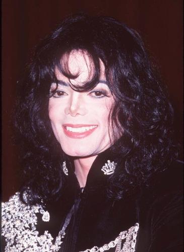 Michael Jackson - Michael Joseph Jackson (born August 29, 1958) is an American musician, entertainer and pop icon, whose successful music career and controversial personal life have been a part of pop culture for the last quarter-century.  Jackson began his musical career at the age of seven as the lead singer of The Jackson 5 and released his first solo recording, Got to Be There in 1971, while remaining a member of the group.[2] He began a full-fledged solo career in 1979 and formally parted with his siblings in 1984.[3] In his solo career, Jackson recorded and co-produced the best-selling album of all time, Thriller, which was named as the world's best-selling album at the 2006 World Music Awards. It has worldwide sales exceeding 104 million.[4] Michael Jackson has received thirteen Grammy awards[5] and charted thirteen number-one singles in the United States.  Throughout his four-decade career, Michael Jackson has been awarded numerous honors including the World Music Award's Best-Selling Pop Male Artist of the Millennium, American Music Award's Artist of the Century Award[6] and the Bambi Award's Pop Artist of the Millennium Award.[7] He is a double-inductee of the Rock and Roll Hall of Fame (once as a member of The Jackson 5 in 1997, and as a solo artist in 2001)[8] and an inductee of the Songwriters Hall of Fame.[9] Raymone Bain, Jackson's PR, claims that Jackson has sold over 750 million units worldwide.[10]  From 1988 to 2005, Jackson lived on his Neverland Ranch property, on which he built an amusement park and private zoo that was frequently attended by disadvantaged and terminally ill children. Rumours of sleepover parties received disparaging media coverage after it was revealed that children frequently slept in his bed or bedroom. These first came to light when he was accused of child sexual abuse in 1993. Michael Jackson's relationship with children was brought into the spotlight again in 2003 during the TV documentary Living with Michael Jackson. This resulted in Jackson being tried, and later acquitted, of more child molestation allegations and several other charges in 2005. Contents [hide] 1 Biography  1.1 1966–1980: Early life and career 1.2 1982–1986: The Thriller era 1.3 1987–1990: Bad and controversies 1.4 1991–1994: Dangerous and further career 1.5 1995–2000: HIStory and Blood on the Dance Floor 1.6 2001–2003: Invincible, Berlin and Martin Bashir 1.7 2003–2006: Trial, acquittal and the aftermath 1.8 2006–present: Visionary, Tokyo and the World Music Awards 2 Discography  2.1 Studio albums 2.2 Number-one singles  2.2.1 US number-one singles 2.2.2 UK number-one singles 3 Filmography  3.1 Notable music videos 3.2 Films 3.3 Videos/DVDs 3.4 Television 3.5 Video games 4 Music samples 5 Further reading 6 References 7 See also  7.1 Michael Jackson articles 7.2 Other related articles 8 External links  Biography  1966–1980: Early life and career Main articles: The Jackson 5 and Off the Wall   The cover to Michael Jackson's 1971's Got to Be There.  Michael Jackson was born in Gary, Indiana. He is the second-youngest brother of seven and the eighth of ten children of Joseph and Katherine Jackson. In 1966, after taking co-lead singing duties with brother Jermaine, the group's name changed from The Jackson Brothers to The Jackson 5. The group played at local clubs and bars, building up a following and eventually signing a contract with Motown Records in 1968.[11] The group hit stardom, with their first four singles which charted at number-one on the Billboard Hot 100. As a solo artist, Jackson released Got to Be There and Ben in 1972. These were released as part of the Jackson 5 franchise and produced successful singles such as 'Got to Be There', 'Ben', and a remake of Bobby Day's 'Rockin' Robin'.  The group's sales declined after 1973, and the group chafed under Motown's strict refusal to allow the Jacksons creative control or input. In 1976, the group signed a new contract with CBS Records (first joining the Philadelphia International division and then Epic Records).[12] When this became apparent to Motown Records, they sued the group for breach of contract.  As a result of the legal proceedings, which were complicated further by the fact that Jermaine Jackson was married to the daughter of Motown president (Berry Gordy), the Jacksons lost the rights to use the 'Jackson 5' name and logo and also Jermaine, who wanted to stay at Motown.[13] They changed their name to 'The Jacksons', featuring youngest brother Randy in Jermaine's place, and continued their successful career, touring internationally and releasing six more albums between 1976 and 1984, with Jermaine eventually re-joining in 1983, making them a sextet.  In 1978, Jackson starred as the scarecrow in The Wiz with former-label mate Diana Ross playing Dorothy.[14] The songs for the musical were arranged by Quincy Jones, who established a partnership with Jackson during the film's production and agreed to produce his first solo album in four years. Off the Wall, released in 1979, was a worldwide hit, and became the first album in history to spawn four top-ten hits, including 'Don't Stop 'Til You Get Enough' and 'Rock with You'.[2]  In January 1980, Jackson won his first awards for his solo efforts at the American Music Awards. He won 'Favorite Soul/R&B Album' (for Off the Wall), 'Favorite Male Soul/R&B Artist' and Favorite Soul/R&B Single (for 'Don't Stop 'Til You Get Enough').[2] Later that month, he also won two Billboard Awards (for 'Top Black Artist' and 'Top Black Album').[2]  On February 27, 1980, Jackson won a Grammy Award for 'Best R&B Vocal Performance, Male' (for 'Don't Stop 'Til You Get Enough').[2]  1982–1986: The Thriller era Main articles: Thriller (album), We Are the World, and Captain EO   The original album cover to 1982's Thriller.  In November 1982, the storybook for E.T.: The Extra-terrestrial was released. It included Jackson reading the story as well as one original song ('Someone in the Dark'). The album later won a Grammy for 'Best Album for Children'.  In December 1982, Jackson released his second Epic album, Thriller, which became the best-selling album in music history. The album spawned seven hit singles, including 'Billie Jean' (which was the first music video by a black artist to receive regular airplay on MTV), 'Beat It' and the album's title track which was accompanied by a revolutionary music video. The thirteen-minute Thriller was critically acclaimed, and massive airplay lead to it being packaged with the featurette Making Michael Jackson's Thriller on VHS, where it became the best-selling music home video ever.[15] Thriller spent 37 weeks at number-one and remained on the Billboard album chart for 122 weeks. It was eventually certified 27x Platinum in the United States.[16]   Jackson with the Reagans in 1984.  In 1983, whilst performing 'Billie Jean' at the Motown 25: Yesterday, Today, Forever concert Jackson debuted what can be regarded as his signature move: the moonwalk.[15] In 1983, he started a sponsorship deal with Pepsi-Cola, and, as part of the deal, he agreed to star in a commercial. While filming a Pepsi commercial with his brothers in 1984, before a live audience, his hair caught on fire when a pyrotechnic effect went wrong. Jackson suffered serious burns on his scalp, which required skin grafts.[17]  In February 1984, Jackson is nominated for twelve Grammy awards and wins eight,[15] breaking the record for the most Grammy Awards won in a single year.[18] Seven were for the critically acclaimed Thriller and the other for the E.T.: The Extra-terrestrial storybook. In 1984, he also won eight American Music Awards and the 'Special Award of Merit' and three MTV Video Music Awards.  After reuniting with his brothers, he then helped to write the Victory album. He then performed and starred in the successful Victory Tour which started on July 6, 1984 and lasted for five months.[15]  In 1985, Jackson was invited to the White House and was personally thanked by then-President Ronald Reagan at a White House ceremony for donating the song 'Beat It' for use in drunk driving prevention television and radio public service announcements.[19]   Jackson continued his charity work in 1985 by co-writing, with Lionel Richie, the hit single 'We Are the World'. The charity single helped to raise money and awareness for the famine in East Africa and was one of the first instances where Jackson was seen as a humanitarian. The song also won a Grammy Award for 'Song of the Year'.[15]   Jackson in the video for 'Beat It'.  Controversy began when Jackson purchased shares in the ATV Music Publishing (a company which owned the rights to most of the Beatles' songs), making himself the majority shareholder. This move angered close friend and songwriter Paul McCartney, who had also made a bid for the company. Ironically, it was McCartney who advised Jackson on the merits of song ownership.[20] Their creative co-writing ended after this event. Following this controversial business deal, tabloid stories of Jackson sleeping in a hyperbaric oxygen chamber to stall the aging-process, and an allegation claiming Jackson attempted to purchase the bones of the Elephant Man inspired the pejorative nickname 'Wacko Jacko'. The name 'Wacko Jacko' would come to be detested by Jackson.[21]  In 1986, Jackson starred in the George Lucas-produced, Francis Ford Coppola-directed 3-D film Captain EO. The film lasted 17 minutes but had costs estimated at $17 million.[22] At the time, it was the most expensive film ever produced on a per-minute basis. In the USA, the Disney theme parks hosted Captain EO. Disneyland featured the film in tomorrow-land from September 18, 1986 until April 7, 1997. It was also featured in Walt Disney World in Epcot from September 12, 1986 until July 6, 1994. Two new songs featured in the film. These were 'Another Part of Me', which later appeared on Bad, and 'We