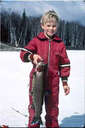 Ice fishing - Small boy with his ice fishing catch of the day