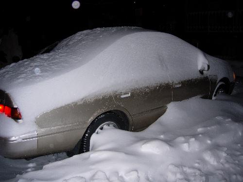 car covered with snow - car covered with snow
