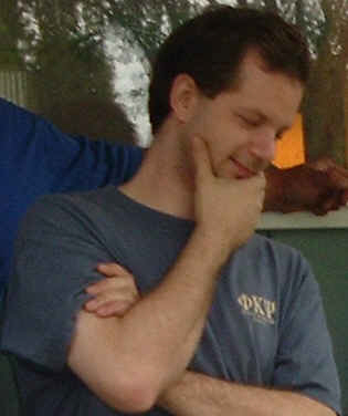 Me - Just me trying to look thoughful, cut out from a group photo (thus the mysterious arm behind my head.)