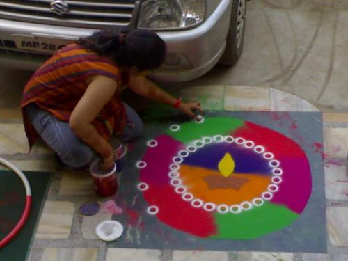 rangoli - hey u remember a name that u  heard in ur old days 'rangoli'... do u remember something about it.In the old days people every person decorate their home.indian culture is very nice and full of joy.