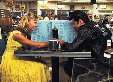 grease  - A rock 'n' roll celebration of growing up and falling in love.