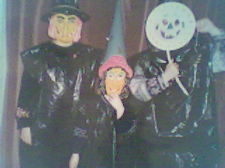Me and my sisters (halloween) - This is me and my sisters on halloween about 5 years ago.Just before we all went out in the neighbourhood trick or treating. Was great being a kid =)