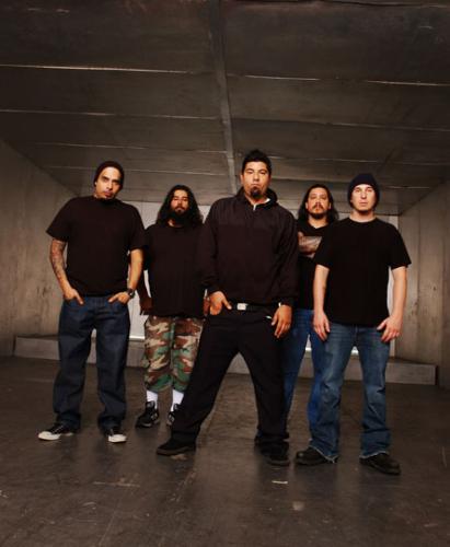 Deftones Picture Gallery - Although the group was more heavy metal-based early on, the early '90s saw the Deftones expand their sound even further, obviously inspired by such groundbreakers as Tool, Rage Against the Machine, and Faith No More. A strong four-song demo was completed soon after, and it landed the group a recording contract with Madonna's label, Maverick. Enlisting the services of Soundgarden and Pantera producer Terry Date (who would eventually become a regular producer for the group), the quartet's debut full-length, Adrenaline, was issued in October of 1995. While it wasn't an instant success, the band built a dedicated fan base the old-fashioned way -- by touring relentlessly (both on their own, and opening for such more established acts as Ozzy Osbourne, L7, and their buddies in Korn). With sales of Adrenaline topping sales of 200,000 copies on word of mouth alone, expectations were high for their sophomore release, Around the Fur. Issued in October of 1997, it more than delivered, catapulting the band to the top of the alt-metal heap on the strength of such MTV/radio favs as 'My Own Summer (Shove It)' and 'Be Quiet and Drive (Far Away),' as turntablist Frank Delgado expanded the group's lineup to a five-piece.