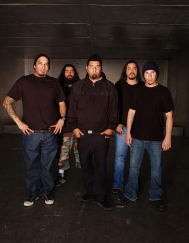 Deftones Picture Gallery - Although the group was more heavy metal-based early on, the early '90s saw the Deftones expand their sound even further, obviously inspired by such groundbreakers as Tool, Rage Against the Machine, and Faith No More. A strong four-song demo was completed soon after, and it landed the group a recording contract with Madonna's label, Maverick. Enlisting the services of Soundgarden and Pantera producer Terry Date (who would eventually become a regular producer for the group), the quartet's debut full-length, Adrenaline, was issued in October of 1995. While it wasn't an instant success, the band built a dedicated fan base the old-fashioned way -- by touring relentlessly (both on their own, and opening for such more established acts as Ozzy Osbourne, L7, and their buddies in Korn). With sales of Adrenaline topping sales of 200,000 copies on word of mouth alone, expectations were high for their sophomore release, Around the Fur. Issued in October of 1997, it more than delivered, catapulting the band to the top of the alt-metal heap on the strength of such MTV/radio favs as 'My Own Summer (Shove It)' and 'Be Quiet and Drive (Far Away),' as turntablist Frank Delgado expanded the group's lineup to a five-piece.