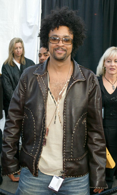 Shaggy - Shaggy (born October 22, 1968, in Kingston, Jamaica as Orville Richard Burrell), is a Jamaican reggae deejay who takes his nickname from Scooby-Doo's companion (possibly from the similarity of their first names). He is especially notable for his distinctive sub-baritone voice.   Biography  His family emigrated to the United States and they settled in the neighborhood of Flatbush, Brooklyn, located in New York City, New York, USA. In 1988, he joined the United States Marine Corps and served during Operation Desert Storm during the Persian Gulf War.  On his return from the Persian Gulf, he decided to pursue his music career and his first hit in 1993: 'Oh Carolina', was a dancehall re-make of a ska hit by the Folkes Brothers. The same year, Shaggy appeared on Kenny Dope's hip hop album 'The Unreleased Project'. He worked together with producers such as Sting Intl., Don One (who cut his first track), Lloyd 'Spiderman' Campbell and Robert Livingston. He had further big hits, including 'Boombastic' in 1995.  He then had a major comeback in 2001, featuring worldwide number-one hit singles 'It Wasn't Me' and 'Angel,' the latter of which was built around Merrilee Rush's 1968 hit 'Angel of the Morning' (which was remade in 1981 by Juice Newton). The album Hot Shot, from which those cuts came, would hit number one on the Billboard 200.  However, his 2002 release Lucky Day, and the 2005 album Clothes Drop failed to match Hot Shot's success.  Shaggy performed the theme for Showtime (film), a 2002 movie.   Discography   Albums 1993 Pure Pleasure 1994 Original Doberman 1995 Boombastic US #34, UK #37 (platinum) 1997 Midnite Lover 2000 Hot Shot US #1, UK #1 (6x platinum) 2002 Hot Shot: Ultramix US #168 2002 Mr. Lover Lover - The Best Of Shaggy...Part 1 UK #20 2002 Lucky Day US #24 (gold) 2003 The Essential Shaggy 2003 Boombastic Hits 2005 Clothes Drop US #144   Singles Year	Title	Chart Positions	Album	 US Hot 100	UK Singles	AUS Singles	 1993	'Oh Carolina'	#59	#1	#4	Pure Pleasure	 1993	'Soon Be Done'	-	#46	-	Pure Pleasure	 1995	'In The Summertime'(featuring Rayvon)	-	#5	#14	Boombastic	 1995	'Boombastic'	#2	#1	#1	Boombastic	 1996	'Why You Treat Me So Bad'(featuring Grand Puba)	-	#11	-	Boombastic	 1996	'The Train Is Coming'(featuring Wayne Wonder)	-	#21	-	Boombastic	 1996	'That Girl'(duet with Maxi Priest)	-	#15	#7	Mr. Lover Lover - The Best Of Shaggy...Part 1	 1997	'Piece Of My Heart'(featuring Marsha)	#72	#7	-	Midnite Lover	 1998	'Luv Me, Luv Me'(featuring Janet Jackson)	#76	-	-	Mr. Lover Lover - The Best Of Shaggy...Part 1	 1998	'I Got You Babe'(Merril Bainbridge featuring Shaggy)	-	-	#62	Welcome to Woop Woop - Original Soundtrack	 2000	'Dance & Shout'	-	#19	#42	Hot Shot	 2001	'It Wasn't Me'(featuring Ricardo 'Rikrok' Ducent)	#1	#1#31 [Import]	#1	Hot Shot	 2001	'Angel'(featuring Rayvon)	#1	#1	#1	Hot Shot	 2001	'Luv Me, Luv Me'(featuring Samantha Cole)	-	#5	#10	Hot Shot	 2001	'Christmas In Jamica'(Toni Braxton featuring Shaggy)	-	-	-	Snowflakes	 2002	'Me Julie'(duet with Ali G)	-	#2	#13	-	 2002	'Hey Sexy Lady'(featuring Brian Gold & Tony Gold)	-	#10	#4	Lucky Day	 2002	'Gebt das Hanf frei!'(Stefan Raab featuring Shaggy)	-	-	-	-	 2003	'Strength Of A Woman'	-	-	#31	Lucky Day	 2003	'Get My Party On'(featuring Chaka Kahn)	-	-	#41	Lucky Day	 2004	'Your Eyes'(with Ricardo 'Rikrok' Ducent)	-	#57	-	-	 2005	'Wild 2Nite'(featuring Olivia)	-	#61	-	Clothes Drop	 2006	'Ultimatum'(featuring Na'Sha)	-	#76	-	Clothes Drop