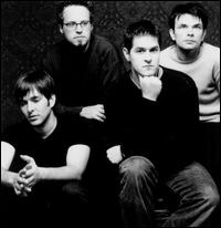 Jars of Clay Greatest Pictures - Jars of Clay were formed at Illinois' Greenville College in 1993 by singer/songwriter Dan Haseltine and keyboardist Charlie Lowell; they soon added guitarist Stephen Mason, who like Haseltine, was a big fan of Toad the Wet Sprocket (a good secular reference point for the typical Jars of Clay sound). All three were music majors in the college's new CCM department, and at first played together just for fun, writing a song for a class recording project. Eventually, they chose a name for the band from a verse in the second book of Corinthians, which emphasized the frailty of the physical vessels in which God had placed the human spirit. Second guitarist Matt Bronleewe joined up later, and drummer Scott Savage became part of the band's live lineup, though they continued to use electronic drum loops on some of their recordings. Encouraged by the response to their small repertoire of originals, the band entered a talent competition run by the Gospel Music Association in 1994. Chosen as finalists on the strength of their demo tape, the band traveled to Nashville to perform for industry executives, and wound up winning the contest. They returned to Greenville and began selling a self-released demo CD called Frail, and record companies were soon calling the group's dorm hoping to sign them. With such intense interest, the band decided to leave school and relocate to Nashville permanently; at this point, Bronleewe departed, wanting to finish school and settle down with his fiancée, and was replaced by Lowell's childhood friend Matt Odmark.