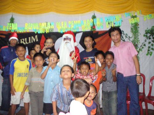 Santa Claus's comin' to Orphanage - You better watch out You better not pout You better not Cry  Um telling you Why Santa Claus's Coming To Orphanage  He's making a list He's checking it twice He's gonna find out Who's naughty or nice  He sees you when you're sleeping He knows when you're awake He knows if you've been bad or good So be good for christmas day  So,You better watch out You better not pout You better not Cry  Um telling you Why Santa Claus's Coming To Orphanage  True, Santa came last week to Orphanage where i work. The children were so happy, they jumped as high as they could. This christmas'll become so joyous to every orphans as never happen before in their life. Just look at the picture, when we take photo.   How's Santas coming to your home? Isn't it wonderful to celebrate that agai? Tell me yours! I have many stories to share you this December.