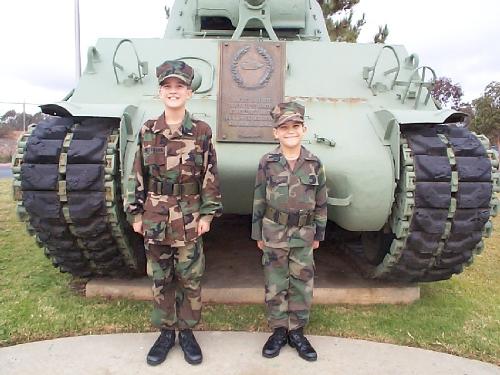 T & L Young Marines Photo - Two young marines standing in front of a tank.
