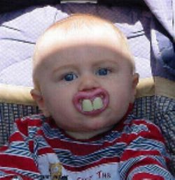 Big Teeth - a kid with big teeth protuding outside