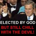 Bush the Devil - Bush shows with his devil worshippers sign.