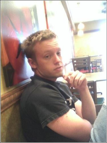 Me - This is me sitting at Subway, not sure what's with my hair.