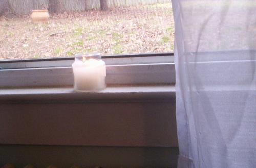 sanctuary - Candle on a window sill