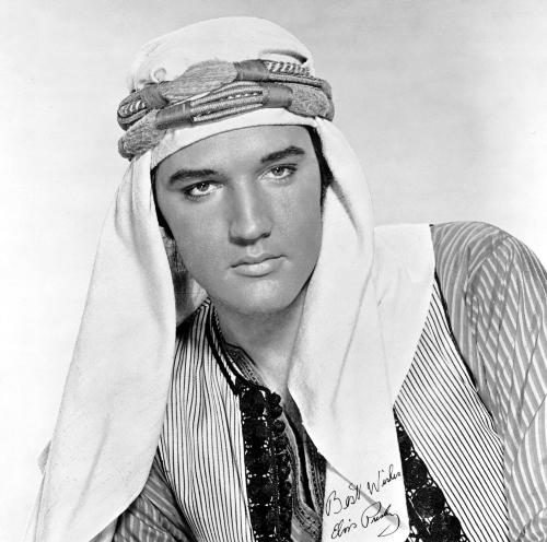 Elvis - When we kiss my heart's on fire Burning with a strange desire And I know, each time I kiss you That your heart's on fire too