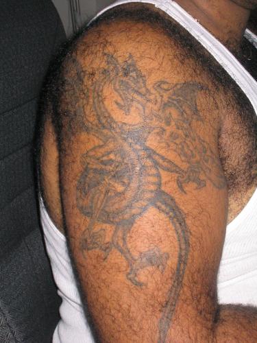 Dragon Tattoo. - Here is a Pic of my Dragon tattoo ! i got this one about 5 years ago. It was my first and fav.
