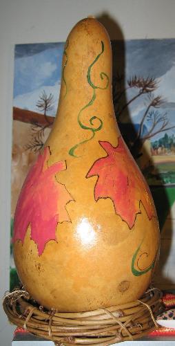 Bottle gourd with maple leaf motif - Maple leaf gourd centerpiece.
