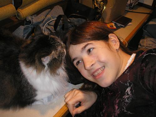 Kitty - This is me and one of my kitties, Lena. She's sniffing my hair after I took a shower, hehe.