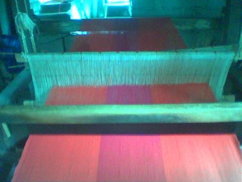 Inabel in the Making - this is a cooperative member of nagbacalan in paoay, ilocos norte weaving a native cloth by using natural threads made of real cotton harvested from their backyard farms.