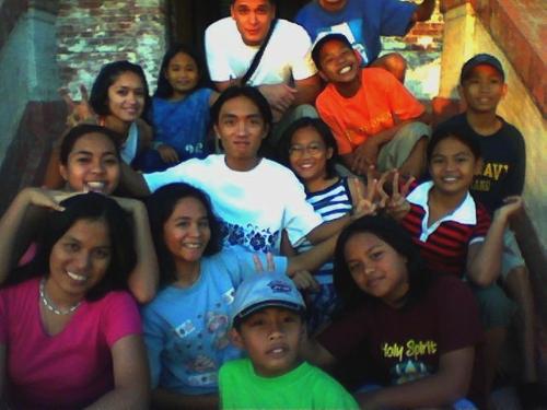 All the Beautiful People - this is me and my cousins. i was fifteen years old when the photo was taken. it was was shot at the stairs of the burgos lighthouse, the biggest lighthouse in the entire philippines.