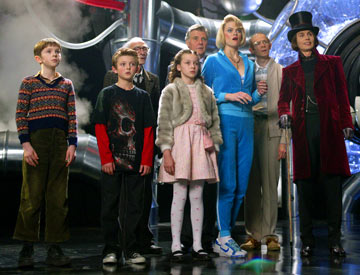 Charlie and the Chocolate Factory  - Most nights in the Bucket home, dinner is a watered-down bowl of cabbage soup, which young Charlie gladly shares with his mother and father and both pairs of grandparents. Every night, the last thing Charlie sees from his window is Willy Wonka's great factory, and he drifts off to sleep dreaming about what might be inside. For nearly fifteen years, no one has seen a single worker going in or coming out of the factory, or caught a glimpse of Wonka himself, yet, great quantities of chocolate are still being made and shipped all over the world. One day Willy Wonka makes a momentous announcement. He will open his famous factory and reveal 'all of its secrets and magic' to five lucky children who find golden tickets hidden inside five randomly selected Wonka chocolate bars. Nothing would make Charlie's family happier than to see him win but the odds are very much against him as they can only afford to buy one chocolate bar a year, for his birthday. One by one, news breaks around the world about the children finding golden tickets and Charlie's hope grows dimmer. But then, something wonderful happens. Charlie finds some money on the snowy street and takes it to the nearest store for a Wonka Whipple-Scrumptious Fudgemallow Delight. There, under the wrapper is a flash of gold. It's the last ticket. Charlie is going to the factory! The family decides that Grandpa Joe, who used to work in the factory, should be the one to accompany Charlie on this adventure. Once inside, Charlie is dazzled by one amazing sight after another. Wondrous gleaming contraptions of Wonka's own invention churn, pop, and whistle, crews of merry Oompa-Loompas mine mountains of fudge beside a frothy chocolate waterfall, a hundred trained squirrels on a hundred tiny stools shell nuts for chocolate bars, and Wonka himself pilots an impossible glass elevator that rockets every which way you can think of through the fantastic factory. Almost as intriguing as his fanciful inventions is Willy Wonka. He thinks about nothing but candy--except, every once in a while, when he seems to be thinking about something that happened long ago, that he can't quite talk about. Meanwhile, the other children prove to be a rotten bunch, and one by one, their greedy personalities lead them into all kinds of trouble that force them off the tour. When only Charlie is left, Willie Wonka reveals the final secret, the absolute grandest prize of all: the keys to the factory itself.