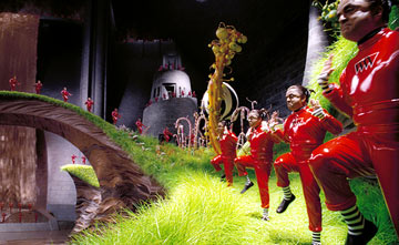 Charlie and the Chocolate Factory  - Most nights in the Bucket home, dinner is a watered-down bowl of cabbage soup, which young Charlie gladly shares with his mother and father and both pairs of grandparents. Every night, the last thing Charlie sees from his window is Willy Wonka's great factory, and he drifts off to sleep dreaming about what might be inside. For nearly fifteen years, no one has seen a single worker going in or coming out of the factory, or caught a glimpse of Wonka himself, yet, great quantities of chocolate are still being made and shipped all over the world. One day Willy Wonka makes a momentous announcement. He will open his famous factory and reveal 'all of its secrets and magic' to five lucky children who find golden tickets hidden inside five randomly selected Wonka chocolate bars. Nothing would make Charlie's family happier than to see him win but the odds are very much against him as they can only afford to buy one chocolate bar a year, for his birthday. One by one, news breaks around the world about the children finding golden tickets and Charlie's hope grows dimmer. But then, something wonderful happens. Charlie finds some money on the snowy street and takes it to the nearest store for a Wonka Whipple-Scrumptious Fudgemallow Delight. There, under the wrapper is a flash of gold. It's the last ticket. Charlie is going to the factory! The family decides that Grandpa Joe, who used to work in the factory, should be the one to accompany Charlie on this adventure. Once inside, Charlie is dazzled by one amazing sight after another. Wondrous gleaming contraptions of Wonka's own invention churn, pop, and whistle, crews of merry Oompa-Loompas mine mountains of fudge beside a frothy chocolate waterfall, a hundred trained squirrels on a hundred tiny stools shell nuts for chocolate bars, and Wonka himself pilots an impossible glass elevator that rockets every which way you can think of through the fantastic factory. Almost as intriguing as his fanciful inventions is Willy Wonka. He thinks about nothing but candy--except, every once in a while, when he seems to be thinking about something that happened long ago, that he can't quite talk about. Meanwhile, the other children prove to be a rotten bunch, and one by one, their greedy personalities lead them into all kinds of trouble that force them off the tour. When only Charlie is left, Willie Wonka reveals the final secret, the absolute grandest prize of all: the keys to the factory itself.